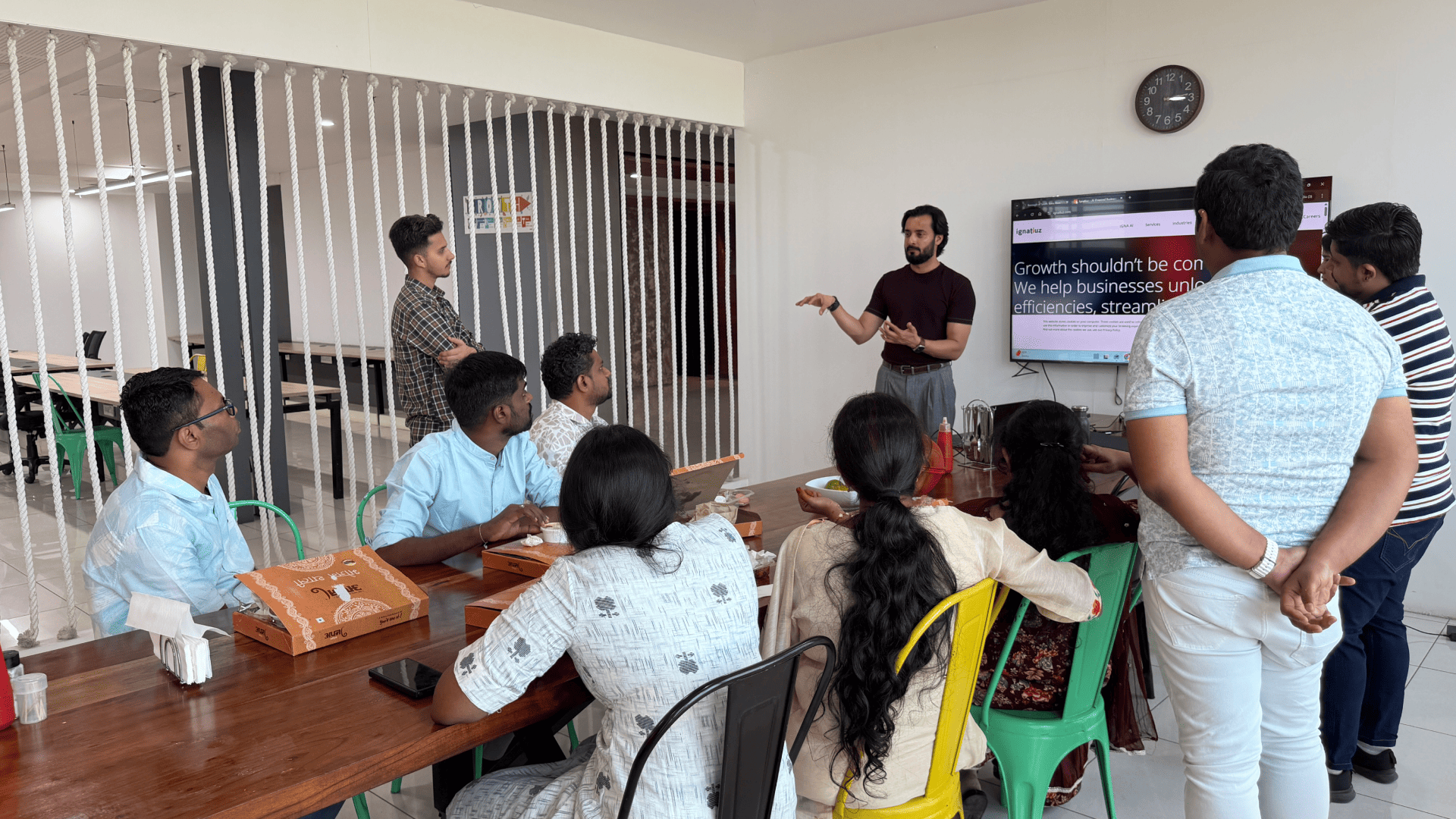 Ignatiuz employees participating in a collaborative team meeting